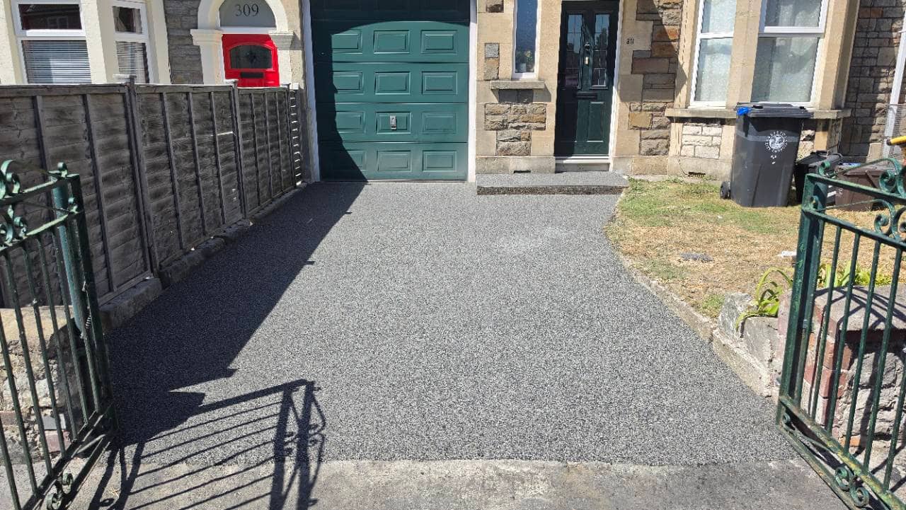 After photo of a completed Vesuvian resin bound driveway and front path in Bristol installed by Quantock Paving