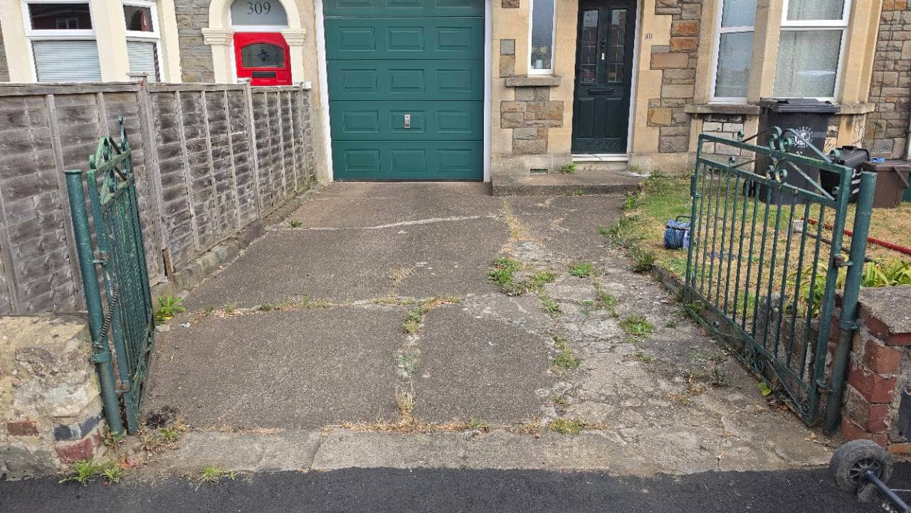 Before photo of a worn concrete driveway and front path in Bristol before Vesuvian resin bound surfacing