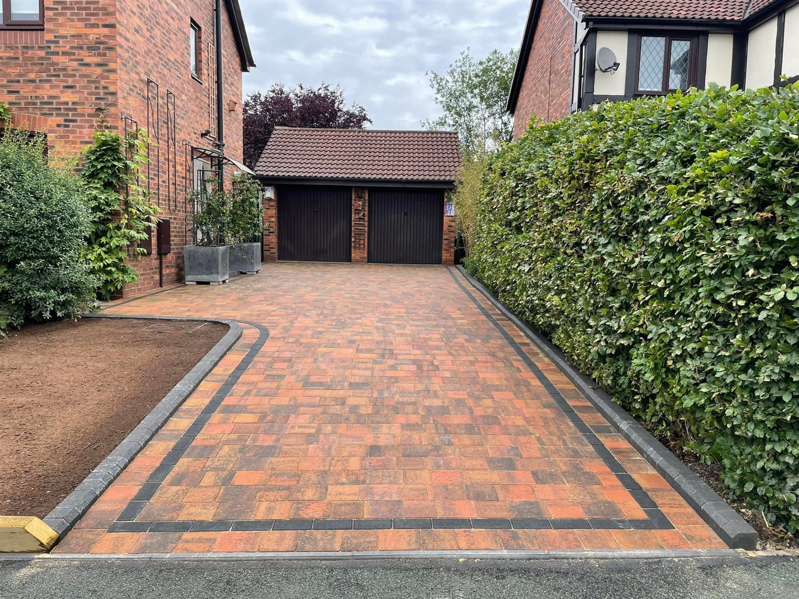 Brindle block paving driveway with charcoal border, installed by Quantock Paving